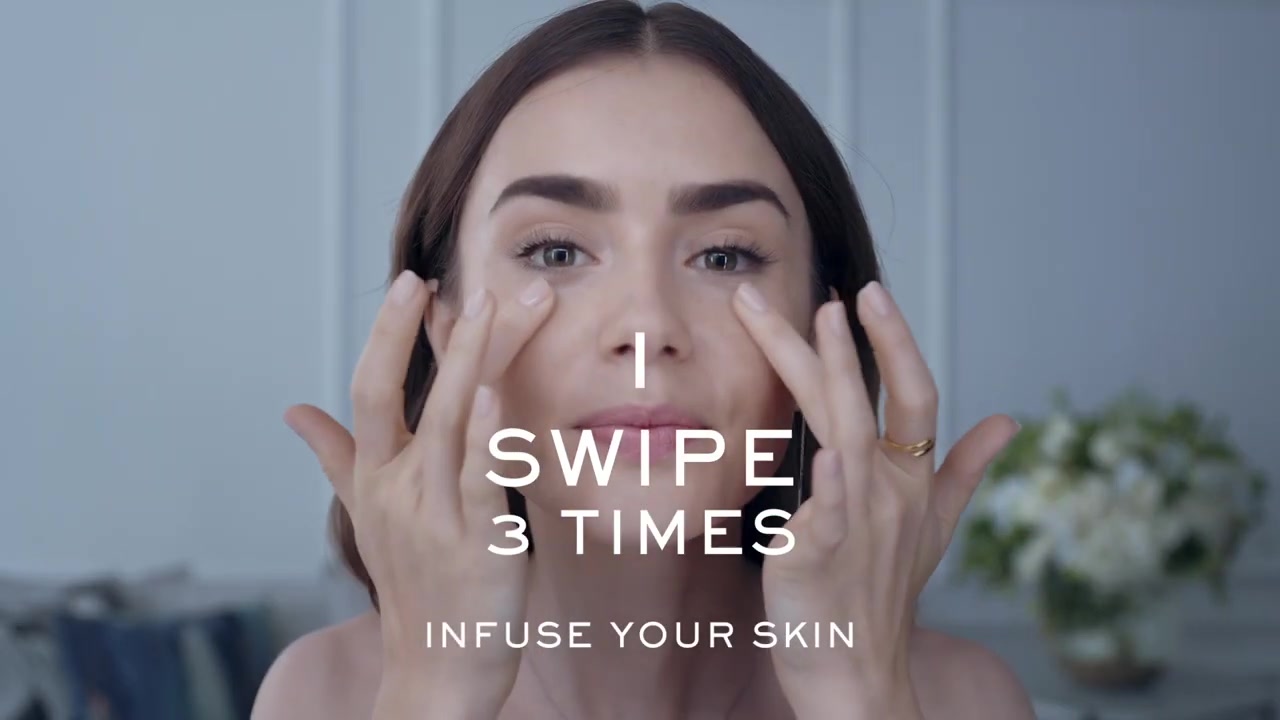 15_seconds_to_Youthful2C_Brighter_Eyes_with_Lily_Collins_-_NEW_Advanced_Genifique_Eye_Cream_032.jpg