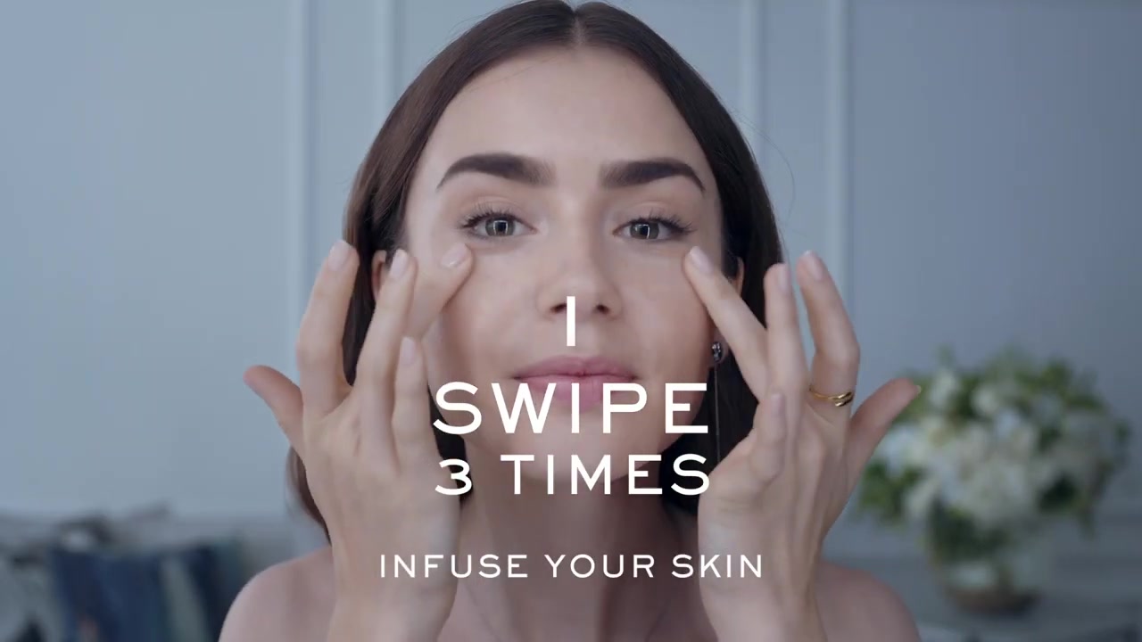 15_seconds_to_Youthful2C_Brighter_Eyes_with_Lily_Collins_-_NEW_Advanced_Genifique_Eye_Cream_033.jpg