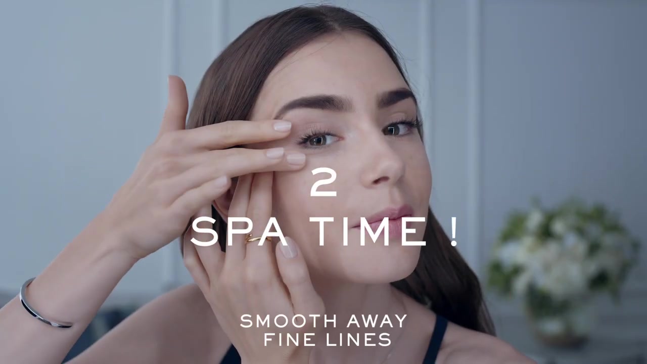 15_seconds_to_Youthful2C_Brighter_Eyes_with_Lily_Collins_-_NEW_Advanced_Genifique_Eye_Cream_060.jpg