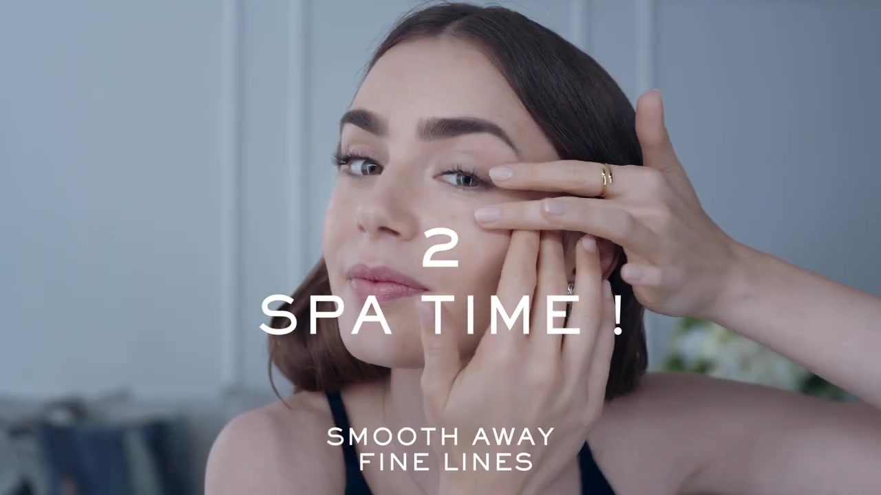 15_seconds_to_Youthful2C_Brighter_Eyes_with_Lily_Collins_-_NEW_Advanced_Genifique_Eye_Cream_065.jpg