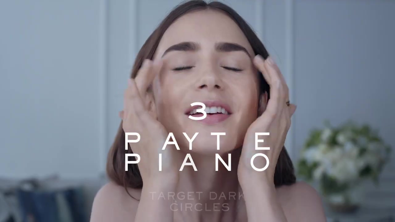 15_seconds_to_Youthful2C_Brighter_Eyes_with_Lily_Collins_-_NEW_Advanced_Genifique_Eye_Cream_073.jpg