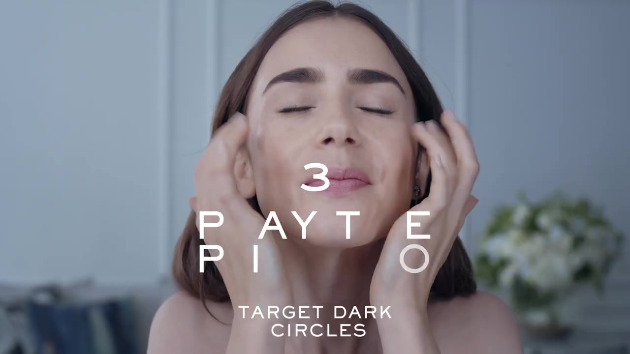 15_seconds_to_Youthful2C_Brighter_Eyes_with_Lily_Collins_-_NEW_Advanced_Genifique_Eye_Cream_074.jpg